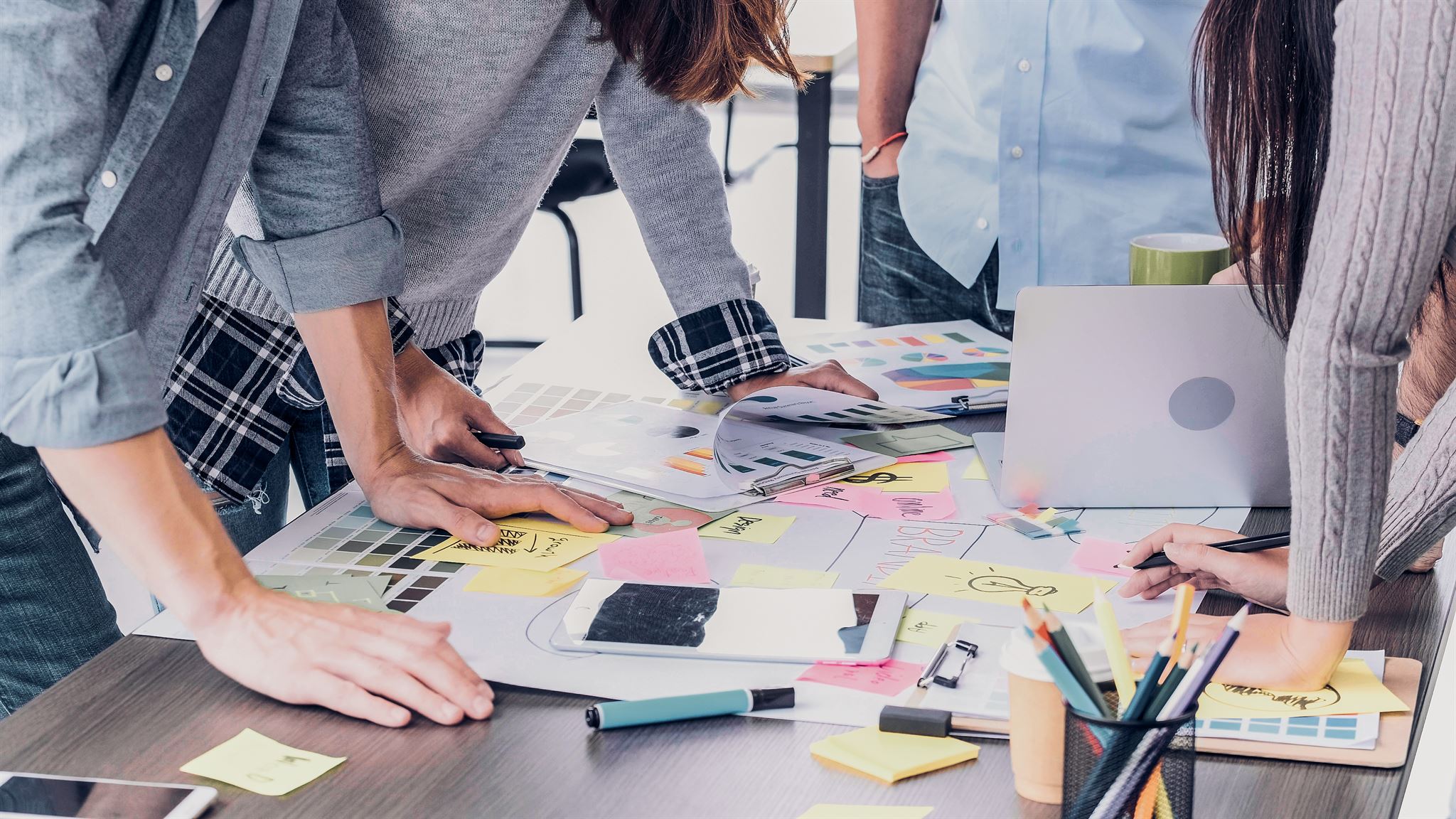 Creative workspace with designers collaborating